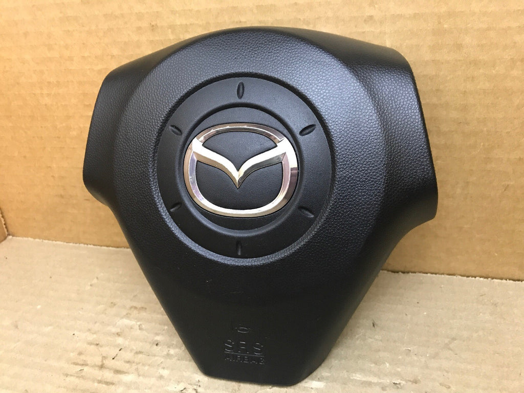 2004 2009 MAZDA 3 LEFT DRIVER SIDE STEERING WHEEL AIRBAG AIR BAG BLACK OEM 2