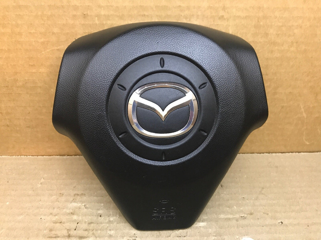 2004 2009 MAZDA 3 LEFT DRIVER SIDE STEERING WHEEL AIRBAG AIR BAG BLACK OEM 0