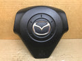 2004 2009 MAZDA 3 LEFT DRIVER SIDE STEERING WHEEL AIRBAG AIR BAG BLACK OEM 0