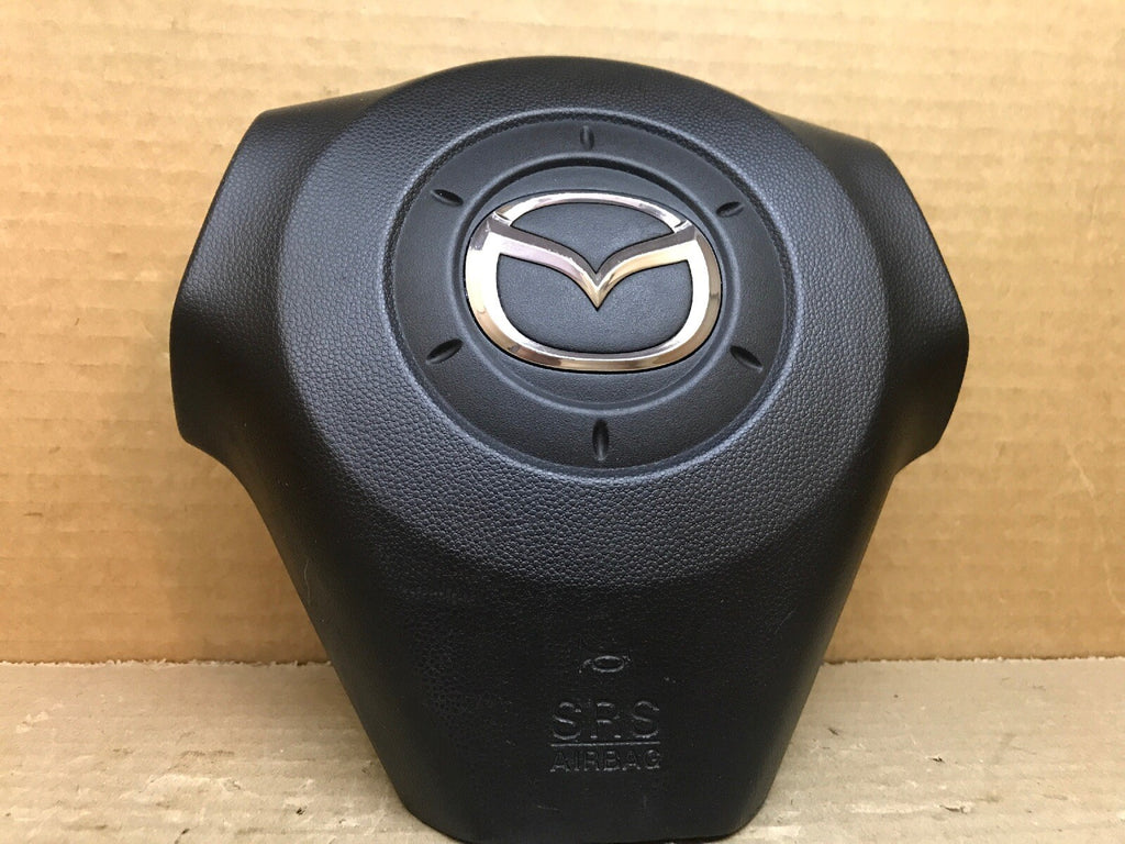 2004 2009 MAZDA 3 LEFT DRIVER SIDE STEERING WHEEL AIRBAG AIR BAG BLACK OEM 3